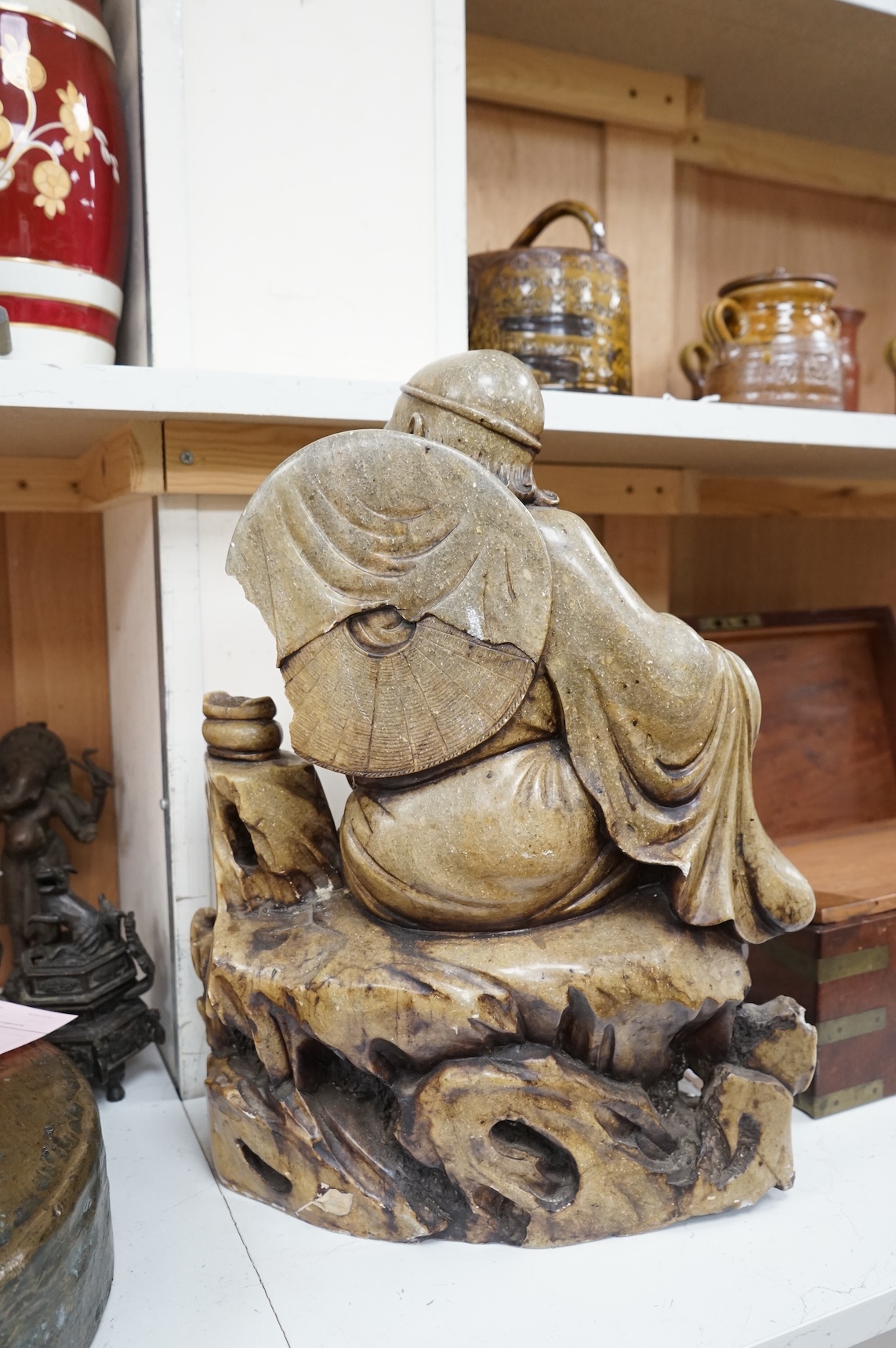 A large Chinese soapstone figure of a Luohan, 48cm